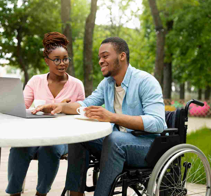 A man in a wheelchair enjoys Innovative NDIS Activities for Participants